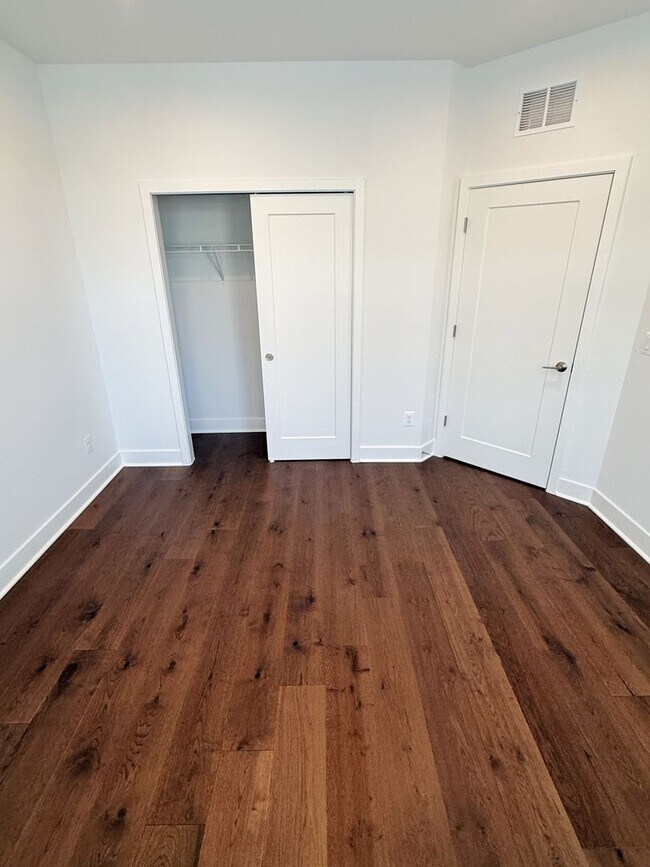 Building Photo - Brand new 4 level, 4 Bedroom Townhome with Elevator!