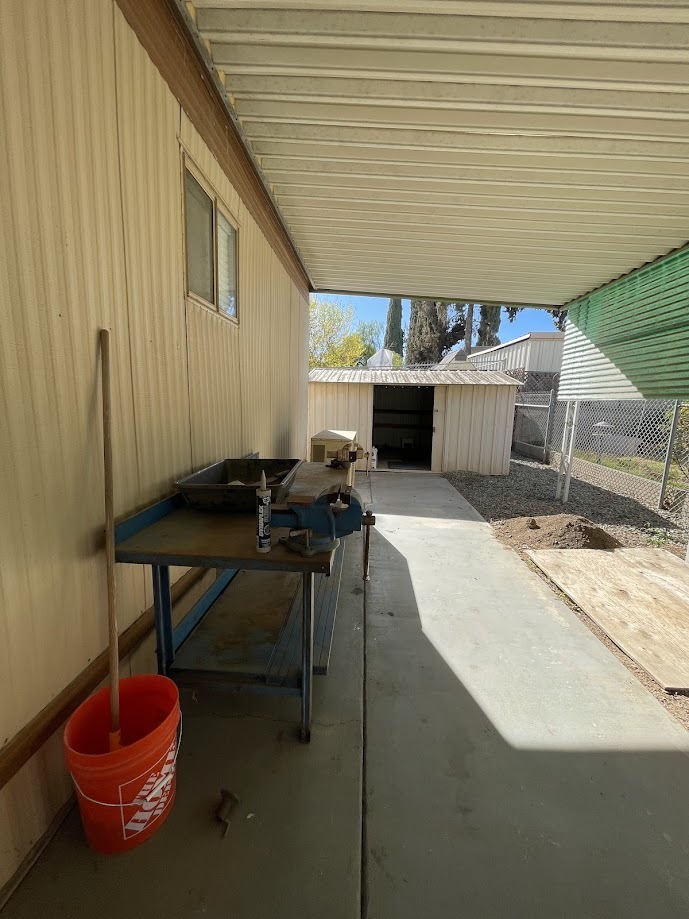 Heavy duty metal work bench with some attached tools. NOT TO BE REMOVED - 17149 Chico Dr