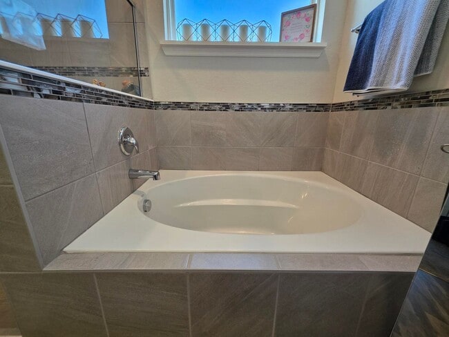 Building Photo - GORGEOUS 4-Bedroom, 3-Bathroom Pool Home, Gated Community