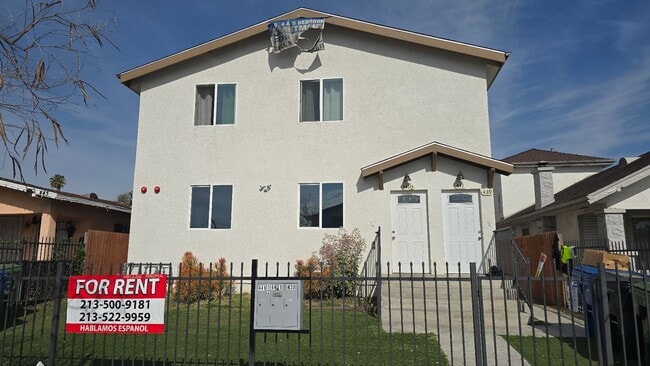 Building Photo - All Bed& Bath at 1st ,2 car Assigned Parking Space at back with access alley,tile &laminate floor...