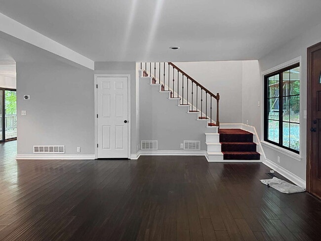 Building Photo - Modern Lake Lanier Retreat | 3BR/3.5BA | Private Swim Dock