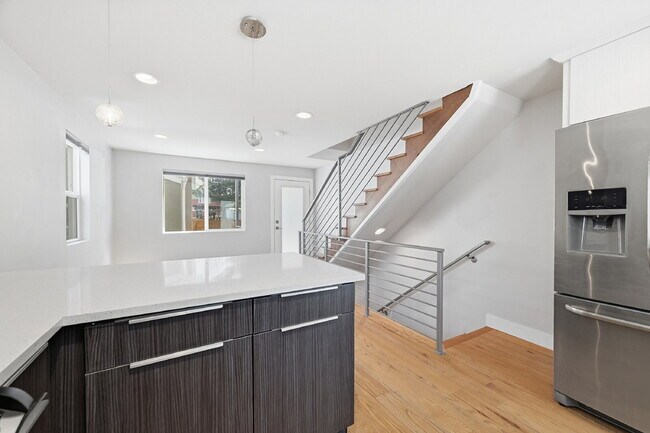 Building Photo - $2,495.95 - 2 Bed, 2 Bath Townhome In Denver with Central AC and In Unit Laundry!