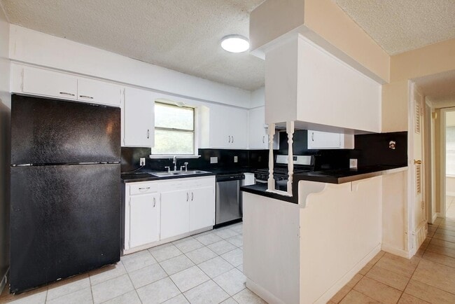 Building Photo - 1202 Artesian Cir