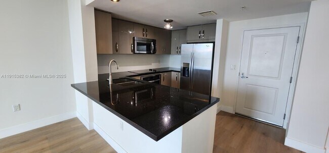 Building Photo - 1250 S Miami Ave