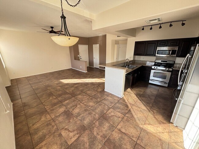 Building Photo - Charming 2Bed/Bath Condo located in a beautiful gated community in the Southwest.