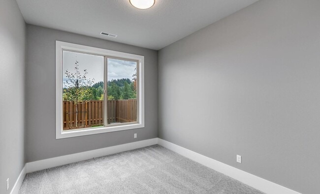 Building Photo - Bethany Stunner - 5 Bedrooms with Main-Level Bed & Bath, Modern Kitchen & Private Fenced Yard