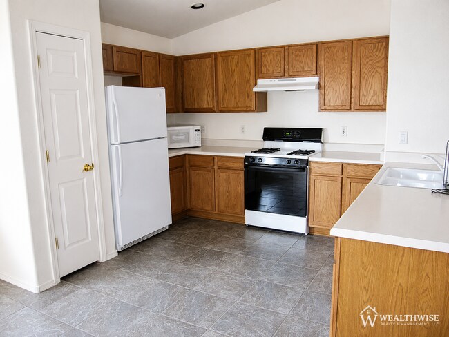 Building Photo - Now Available! Spacious 3 Bedroom Home with Den in Rita Ranch