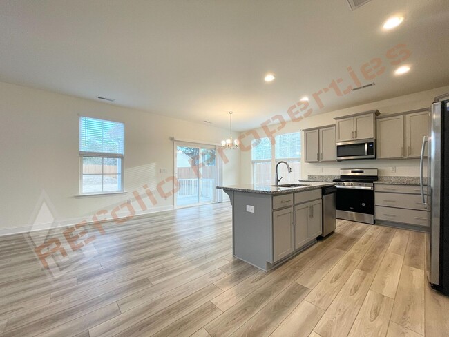 Building Photo - Beautiful 3 Bedroom 2-Car Garage Home w/Lo...