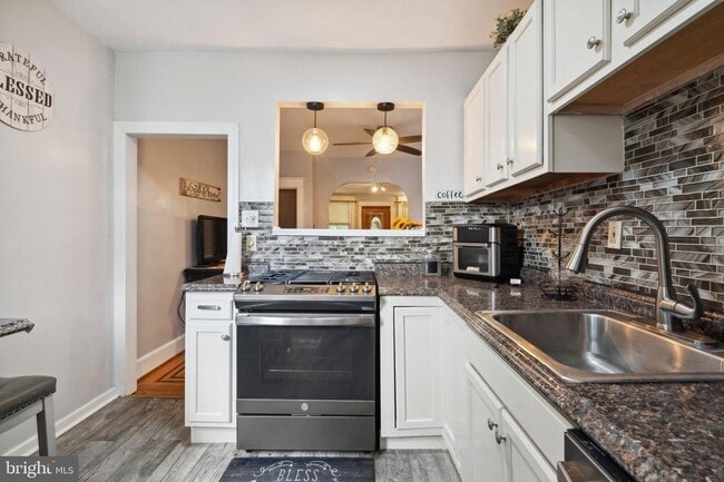 Building Photo - 7117 Woolston Ave