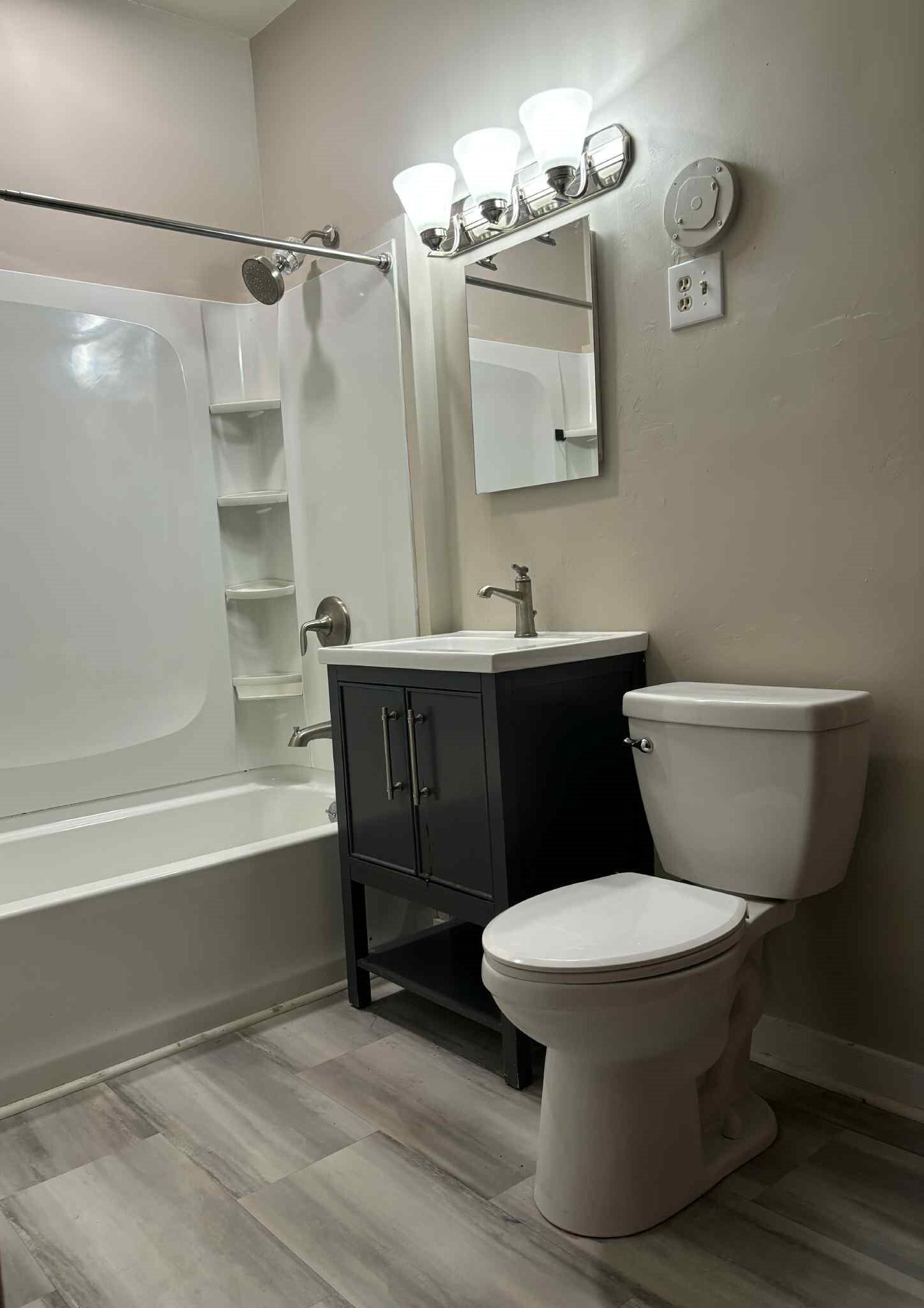 bathroom with tub and shower - 633 E Burleigh St