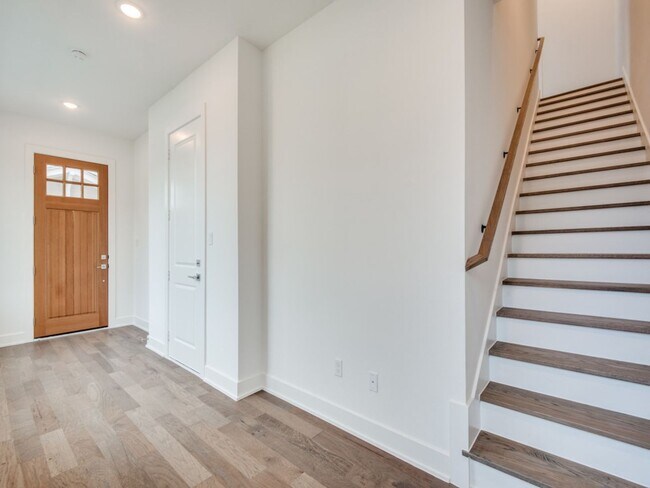 Building Photo - Welcome to a beautiful Craftsman-style end...