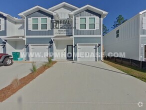 Building Photo - Stunning New Townhome Near Beaches – Move ...