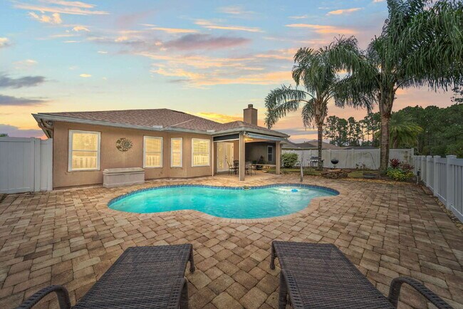 Building Photo - Luxurious Palm Coast Retreat: 4-Bed 3 Bath...