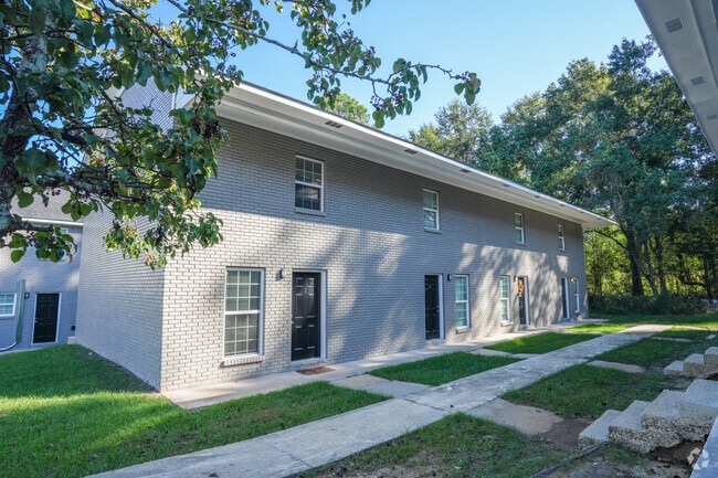 Newly Renovated Grey Buildings - Beverly Manor