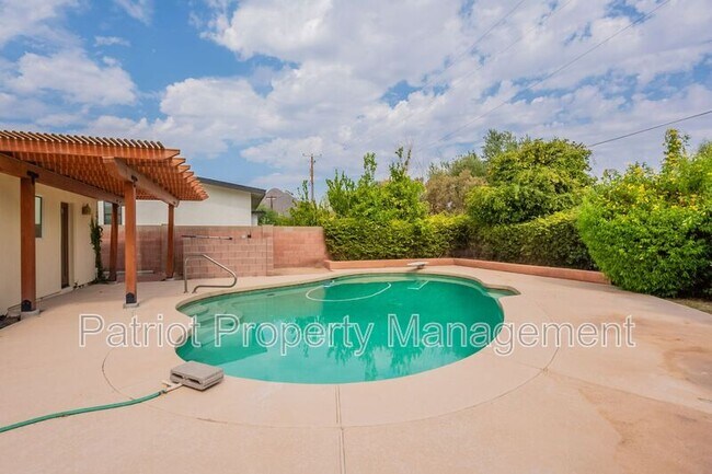 Building Photo - 7024 E Orange Blossom Ln