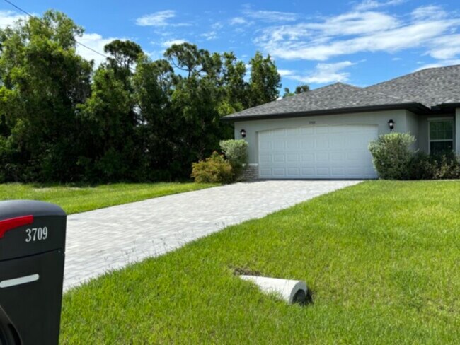 Building Photo - Spacious 4 Bedroom 2 Bath Home in NW Cape! Coming Soon!