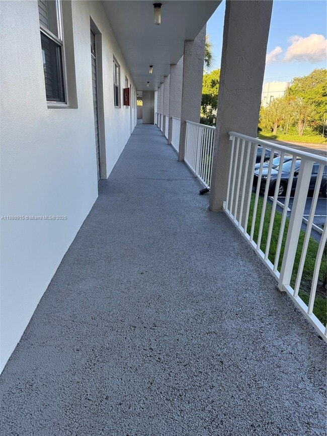 Building Photo - 8595 Sunrise Lakes Blvd