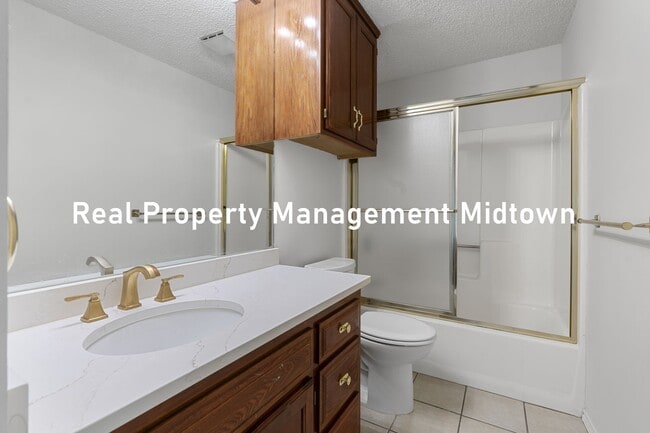 Building Photo - Charming Condo in Established Community of...