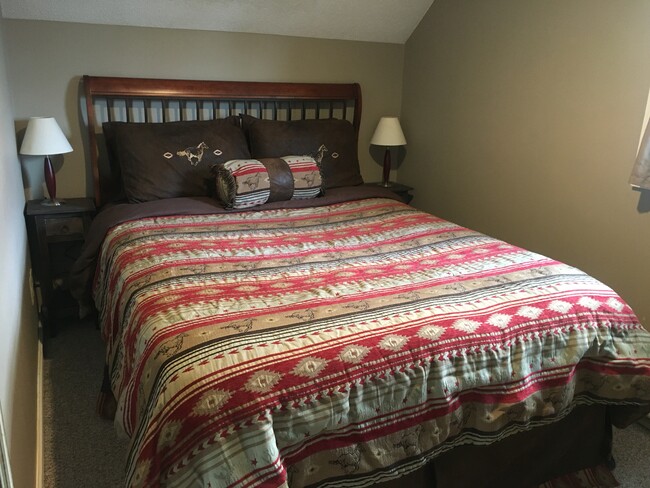 Bedroom with queen bed - 408 3rd Ave. E