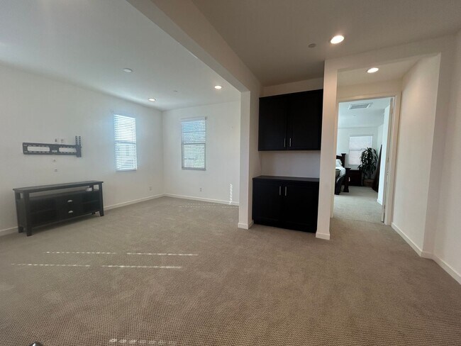 Building Photo - Modern 4 Bedroom Home with Downstairs Suite, Owned Solar & Resort-Style HOA Amenities