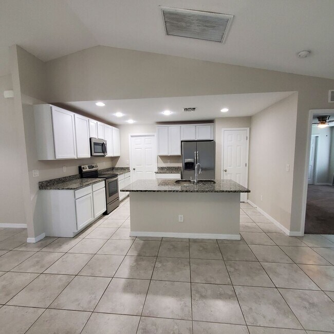 Building Photo - Coming Soon! 4 Bedroom 2 Bath Annual Rental in NW Cape!