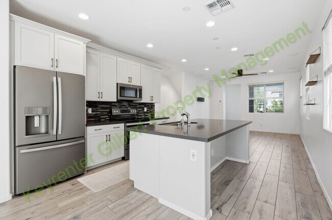 Building Photo - Modern Gilbert Lakeview Townhome in The La...