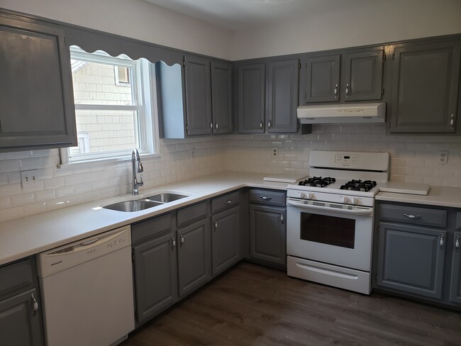 Cabinets and backsplash newly updated - 375 Hope St