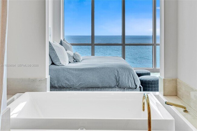 Building Photo - 10295 Collins Ave