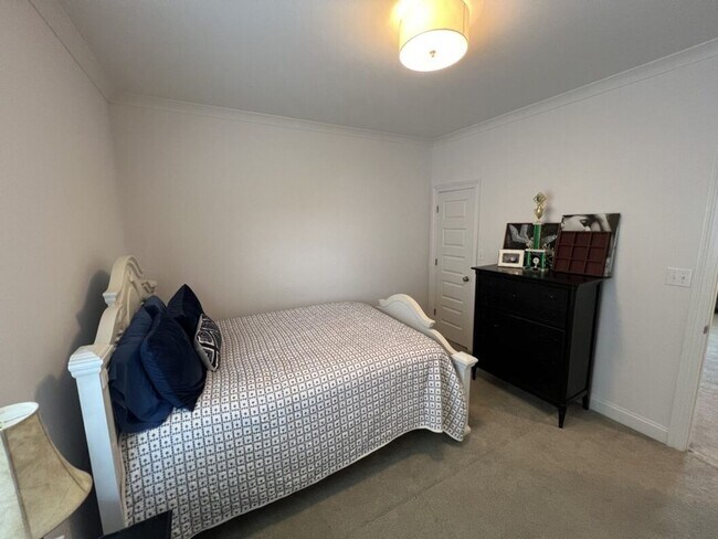 Building Photo - Luxury 4BR Home in Americana | 11 Ft Ceilings, Courtyard Living & Furnished Option at $3,950