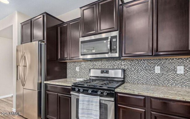 Building Photo - 41007 W Portis Dr