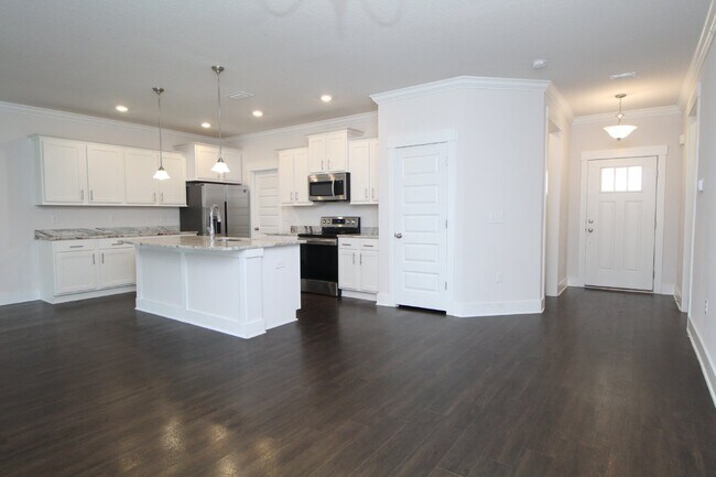 Building Photo - 3BR/2BA Cantonment New Construction Townhome with 2-Car Garage, Granite Kitchen & Low-Maintenance...