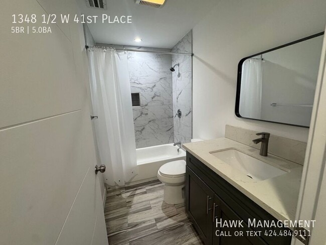 Building Photo - 1348 1/2 W 41st Place-