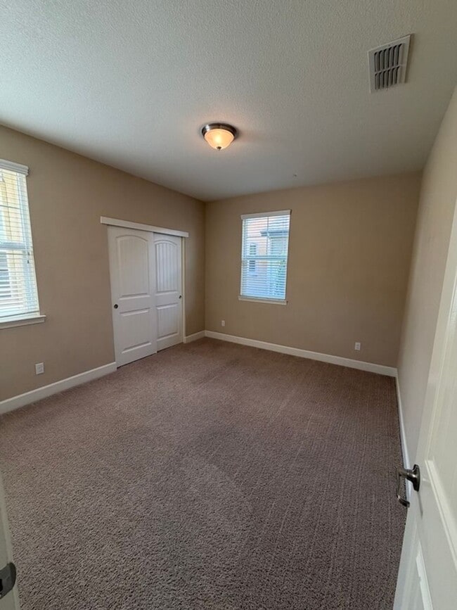 Building Photo - Solar Home with EV Garage Charging. 4 Bedroom Home with Downstairs Bedroom and Full Bathroom.