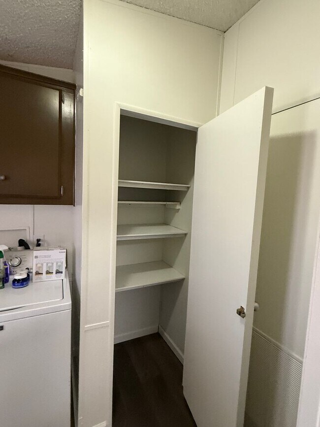 Building Photo - Large Remodeled Doublewide with 2 Car Garage.