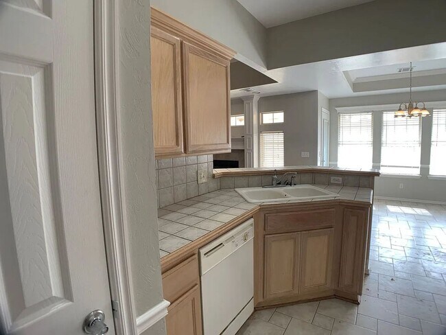 Building Photo - Spacious 4-Bedroom Home | Fenced Yard & 2-Car Garage