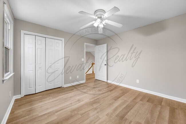Building Photo - Four Bedroom Two Story with Two Car Garage...