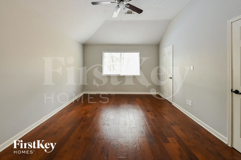 Building Photo - 6722 Woodland Oaks