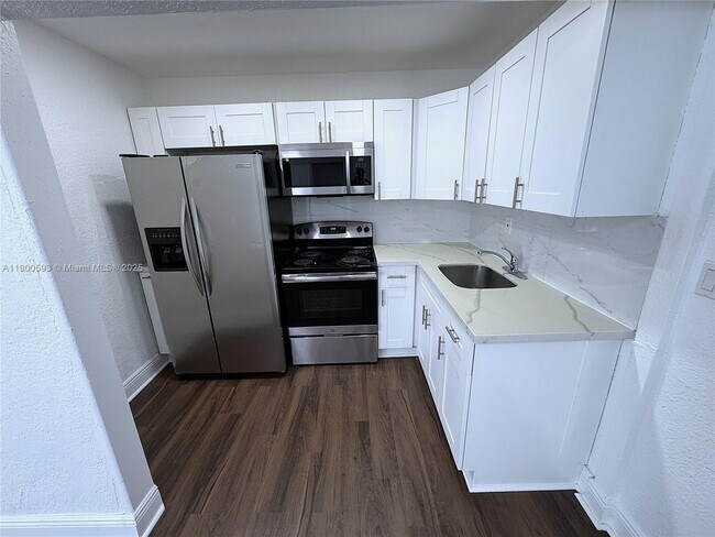 Building Photo - 1025 NW 7th Ave