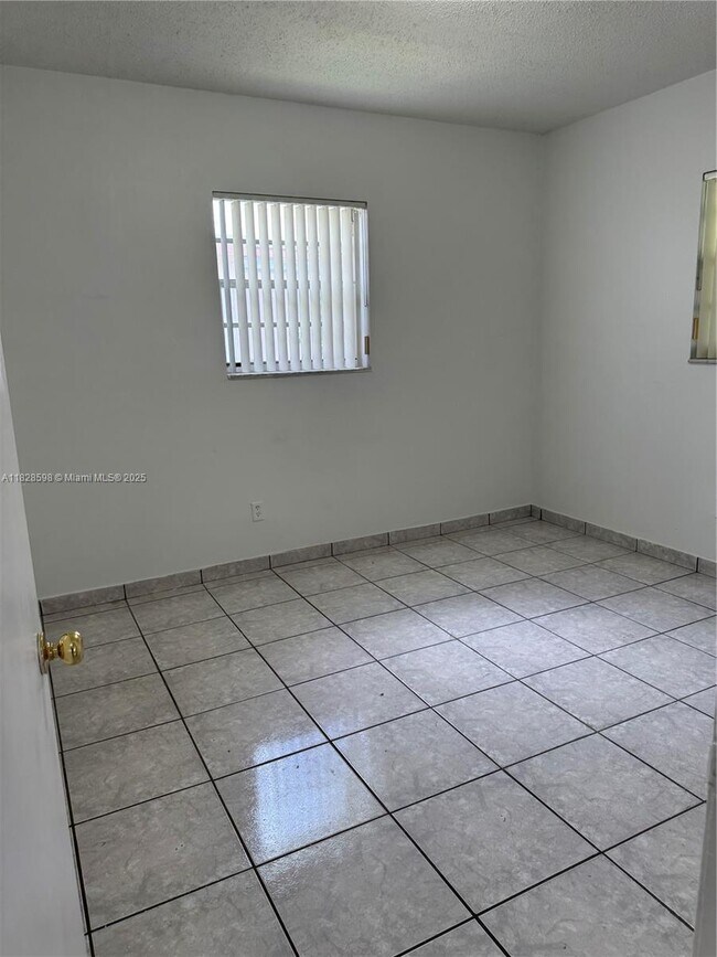Building Photo - 613 NW 58th Ave