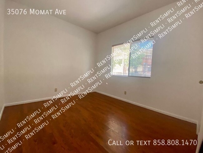 Building Photo - 35076 Momat Ave