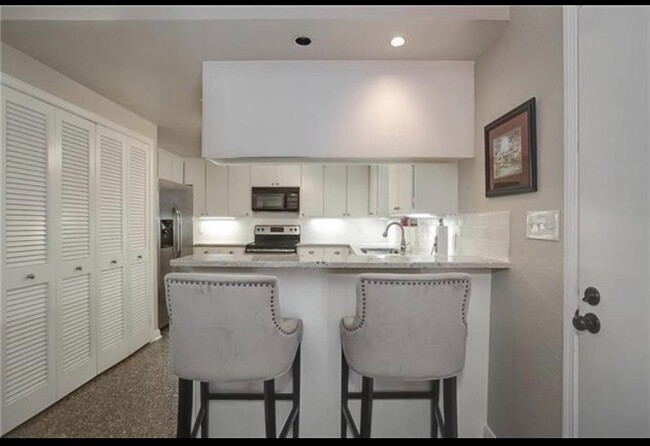 Kitchen and Laundry Closet - 3005 Tanglewood Park W