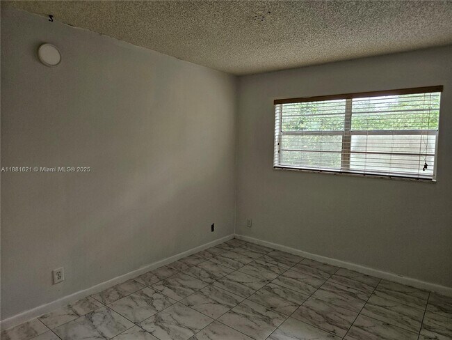 Building Photo - 11131 Royal Palm Blvd