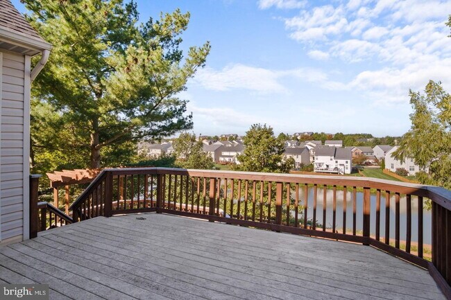 Building Photo - Spacious 4-Bedroom Home with Lake Views & Finished Basement