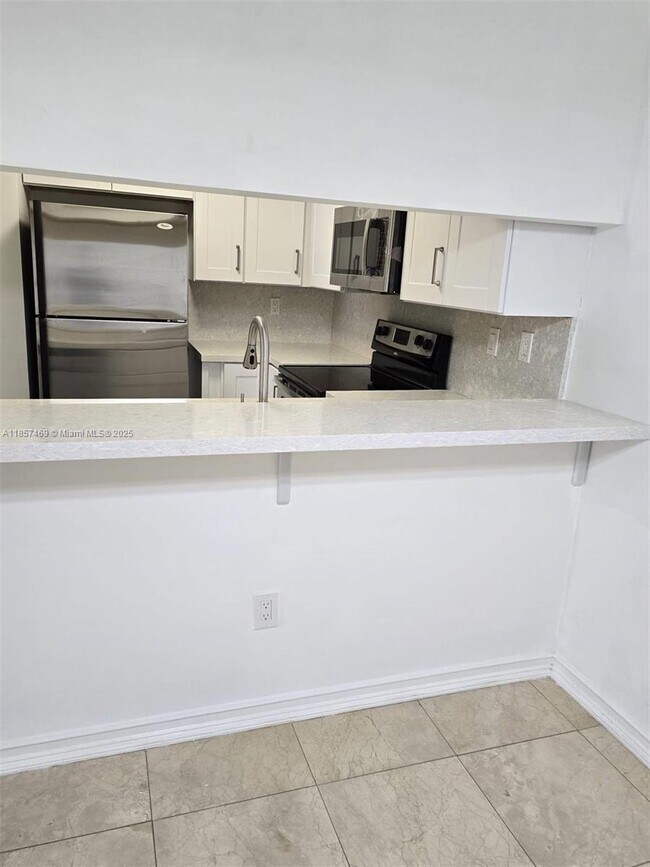 Building Photo - 8999 SW 123rd Ct