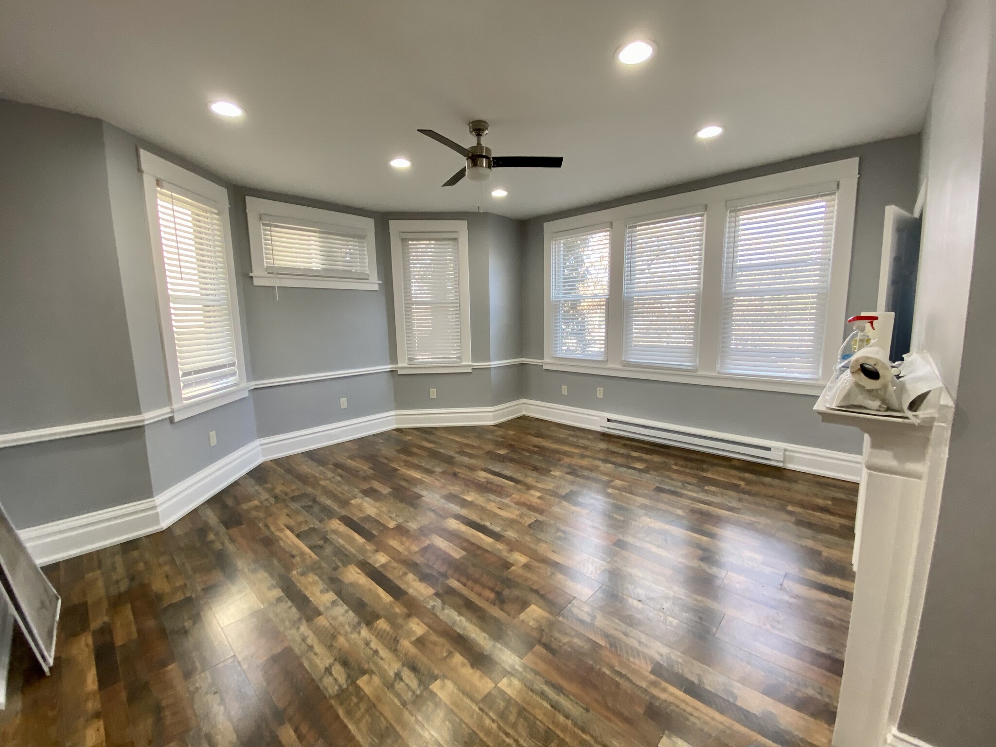 Living room with decorative fireplace. Apartment A. - 605 Beechwood Ave