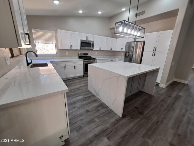 Building Photo - 9074 E Caribbean Ln