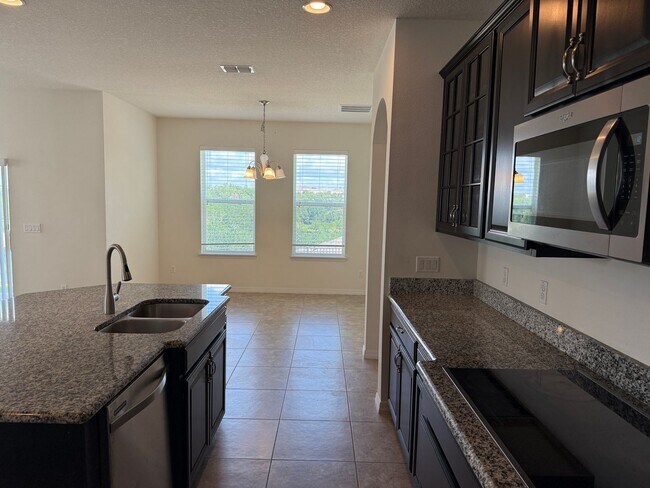 Building Photo - BEAUTIFUL 4 BEDROOMS, 3 BATHS,  SINGLE FAMILY HOME IN HARVEST LANDING IN CLERMONT