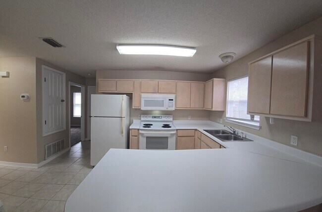 Building Photo - 7720 Lola Cir