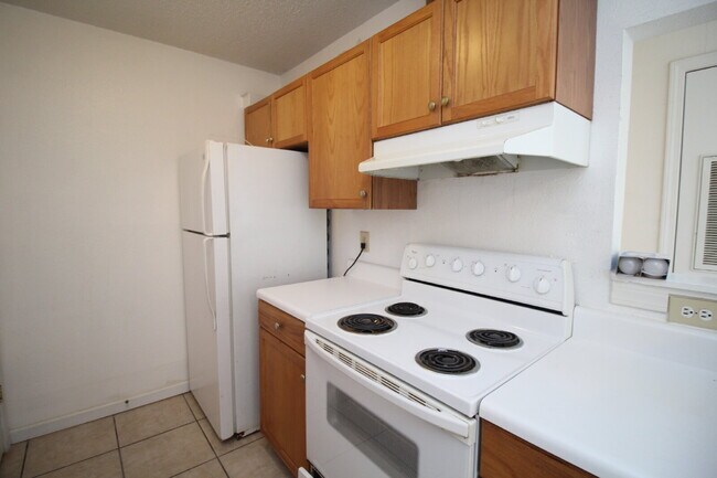 Building Photo - Spacious Vinyl-Sided 2BR Apartment with Open Layout, Private Patio, and Pet-Friendly Options – Av...