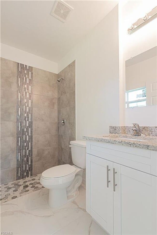 Building Photo - AVAILABLE NOW-TROPIC ACRES-THREE BEDROOM TWO BATH SINGLE FAMILY HOME.